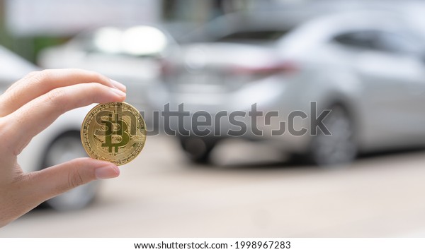 buy second hand car with digital\
cryptocurrency money gold, Bitcoin. Automotive transportation\
industry merge with technology exchange financial market can pay\
money to seller online in\
blockchain.
