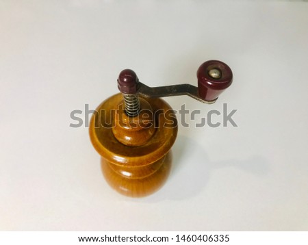 Buy small wooden pepper grinder wonderful portable kitchen ware objects macro shot of different alternative angles on white background.