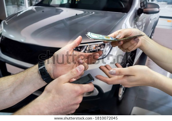 the buyer gives money to buy or rent a new car.\
concept of a successful\
deal.