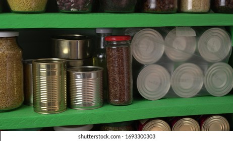 Buying In Bulk To Get Through The Coronavirus Outbreak. Home Storage With Canned, Boxed, And Shelf-stable Items. Dry Beans, Rice, Nuts, Seeds, Vegetables, Milk, Grains, Water, Emergency Food Supplies