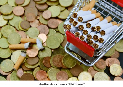 Buying Cigarettes Lose Money And Health . (soft Focus,lens Blur)
Cigarette In The Shopping Cart , Money .