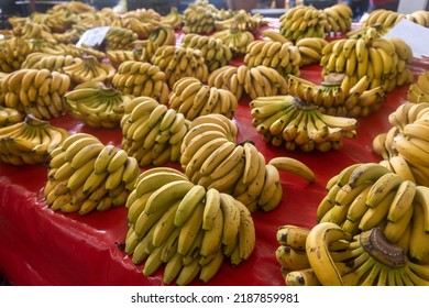 Buying Fresh Organic Produce At The Farmers' Market. Fresh Bananas On The Counter