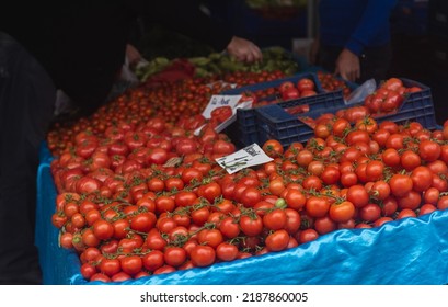 Buying Fresh Organic Produce At The Farmers' Market. Fresh Tomatoes On The Counter