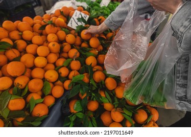 Buying Fresh Organic Produce At The Farmers' Market.