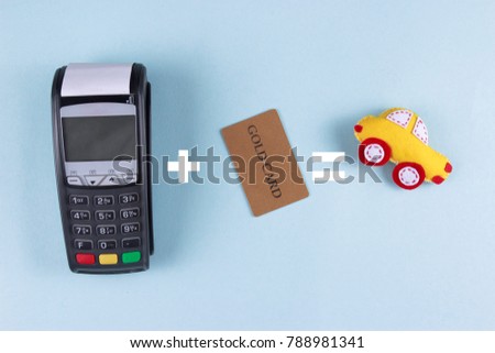 Buying a new car concept. Felt toy car with terminal