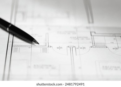 Buying a new house from a developer, plan design sketch of an apartment on the desk