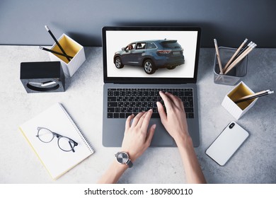 Buying Online. Woman Choosing Car Using Laptop, Top View