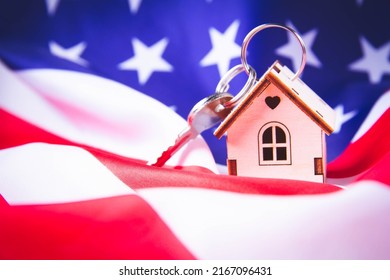 Buying Real Estate In The USA. American House Keys. Moving To New York. Flag And Keys Close-up. Renting An Apartment Abroad.