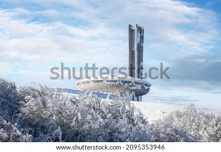 Buzludzha, Bulgaria - The Memorial House of the Bulgarian Communist Party sits on Buzludzha Peak. Abandoned communist building in the Balkan mountain at winter with snow