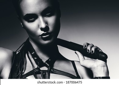 Bw Portrait Of Woman With Whip Around Neck