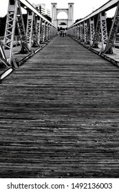 B&W symmetrical shot of the suspension bridge in Waco Tx