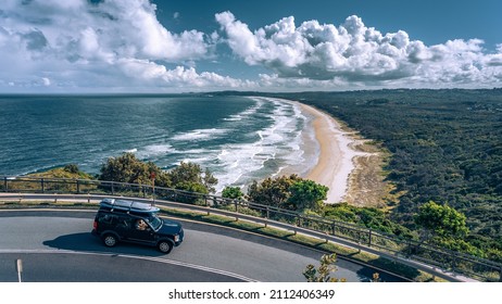 Byron Bay, NSW, Australia - Jan 23, 2022: Picturesque Lookout At The Beach With A Car Passing By In The Foreground