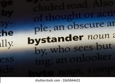 bystander word in a dictionary. bystander concept.