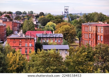Bytom city in Poland. Cityscape with former industrial architecture - coal mine headframe in background.