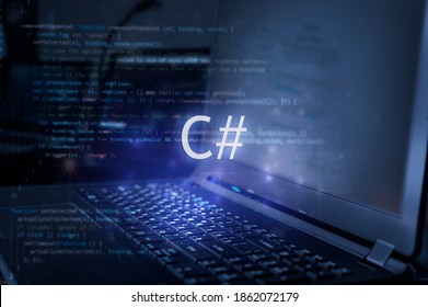 C# inscription against laptop and code background. Learn c sharp programming language, computer courses, training.  - Shutterstock ID 1862072179