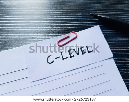 C - level writting on table background. 
