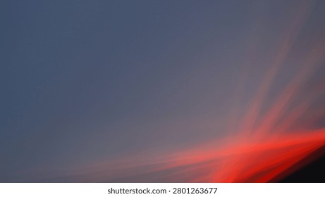 An I C M image of a sunset moving the camera to create images of lines of red light which can encourage your imagination to wander