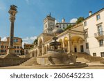 C16th Loggia di San Giovanni, Udine, Italy.A blend of Renaissance and Baroque.Loggia with columns and arches. Centre:clock tower. Front: San Marco lion on column, C16th multi-tiered cascading fountain