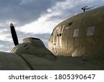 C-47 Skytrain (DC-3) from behind with the sunset.