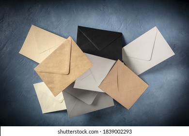 C6 Envelopes, Brown, Gray, And Black, Flying In The Air