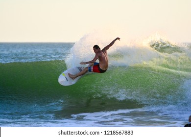 CA, 2018 A Tourist Surfing In Iguana Beach. Tola, Rivas, Nicaragua.
