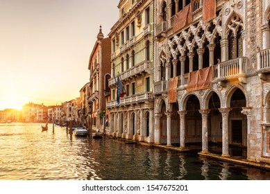 Ca' d'Oro palace (Golden House) at sunset, Venice, Italy. It is landmark of Venice. Beautiful view of Grand Canal in Venice city center in sunlight. Scenery of old buildings in evening. Travel theme.