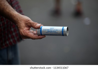 CABA, Buenos Aires / Argentina - 12-14-2017 : A Man Shows Used Tear Gas Can During Clashes In Protest Against Mauricio Macri Government Policies. 