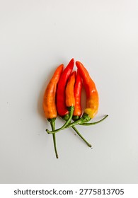 Cabai rawit setan or devil's cayenne pepper, has a level of spiciness above the average. Often used in traditional Indonesian cuisine. Isolated on white background