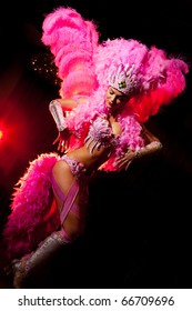 Cabaret Dancer Over Dark Background