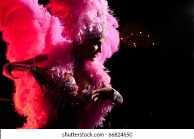 Cabaret Dancer Over Dark Background