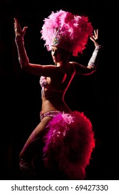 Cabaret Dancer Over Dark Background