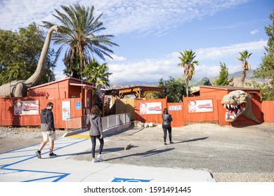 Cabazon, California/United States - 11/22/2019: People Walk Towards The Entrance To The Cabazon Dinosaur Roadside Attraction And Museum.