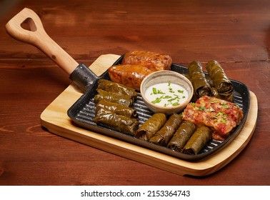 Cabbage Dolma With Green Shrub Dolma And White Sauce