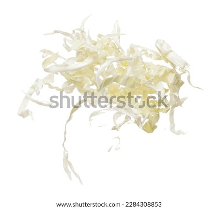 Cabbage fly in mid air, green fresh vegetable cabbage cut chop slice food. Organic fresh vegetable with eaten leaf of cabbage falling, close up texture. White background isolated freeze motion