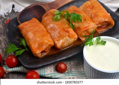 Cabbage rolls stuffed with ground meat and rice. Delicious homemade stuffed cabbage leaves with meat, rice and spices