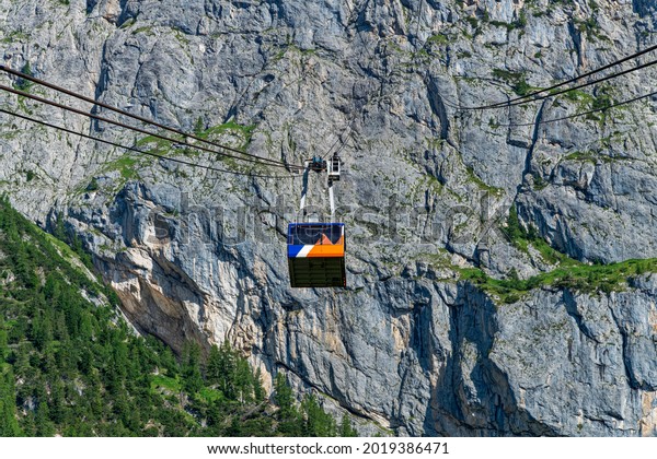 Cabin of the\
cable car suspended in the\
void.