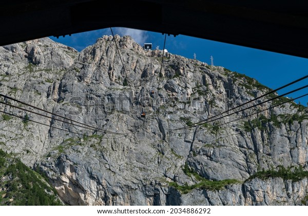 Cabin of the cable car suspended in the void\
of Marmolada.
