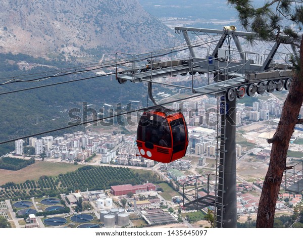 cabin cable road lift Tunek Tepe mountain in the\
suburbs of Antalya Turkey
