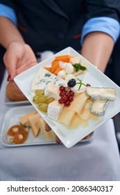 Cabin Crew Member Showing Food To Camera