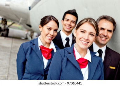 Cabin Crew Team With Pilots And Flight Attendants Smiling