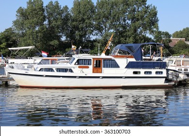 Cabin Cruiser At Marina