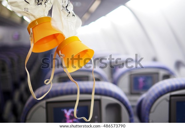 cabin oxygen mask\
drop from the cabin\
ceiling