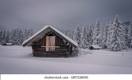 A Cabin In A Snowy Scenery 