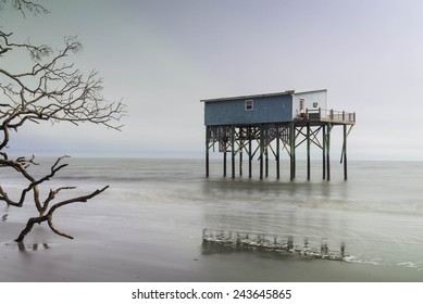 A cabin still stands where there used to be land on Hunting Island State Park in Beaufort, South Carolina