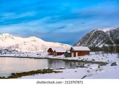 Cabins covered by snow in Norway - Shutterstock ID 2123707871