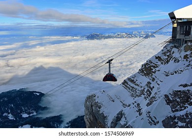 The cable car Dragon Ride at mount Pilatus and the sea of mist.  - Powered by Shutterstock