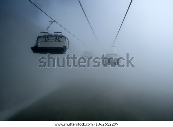 cable car in the\
fog