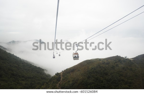 Cable car in the\
fog