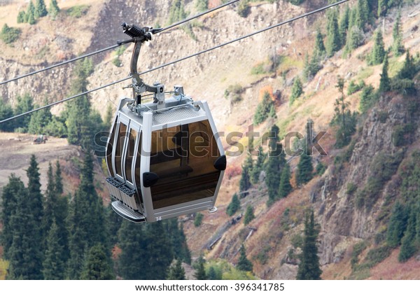 Cable car lift at alpine ski resort shimbulak\
in Kazakhstan