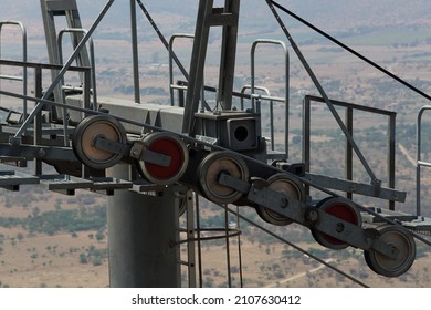 Cable Car Machinery Mounted High Above The Farmlands Below